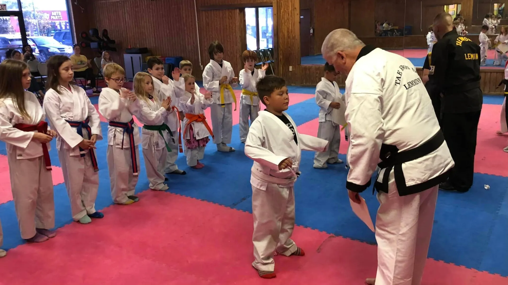 Grand Master James Lemminn with kids at Dunedin Taekwondo Academy in Dunedin Florida