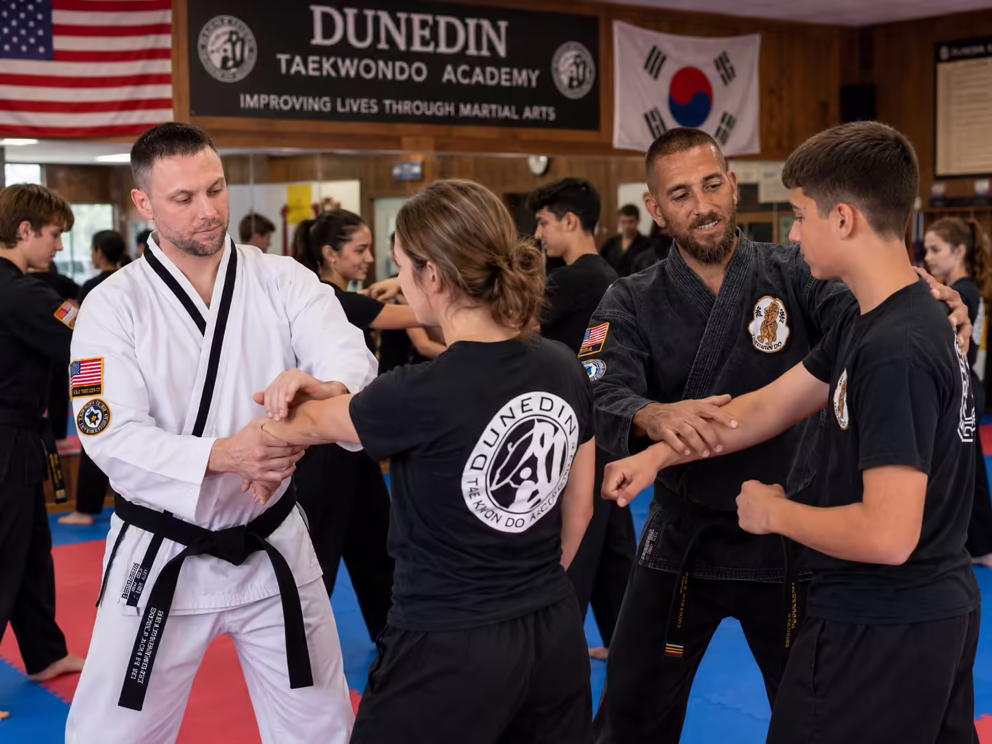Women and teens learning self-defense at Dunedin Taekwondo Academy