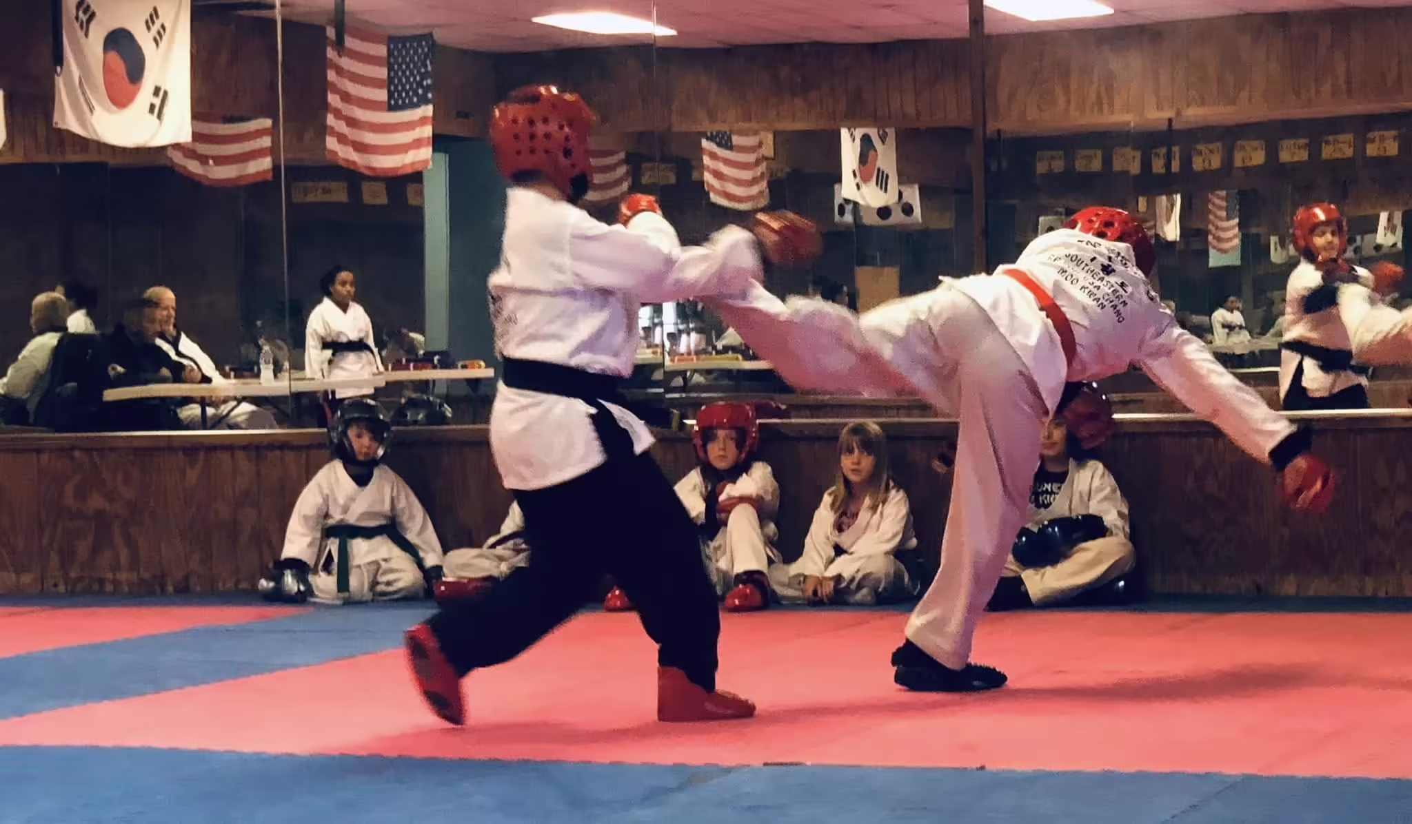 Kid practicing kicks at Dunedin Taekwondo Academy
