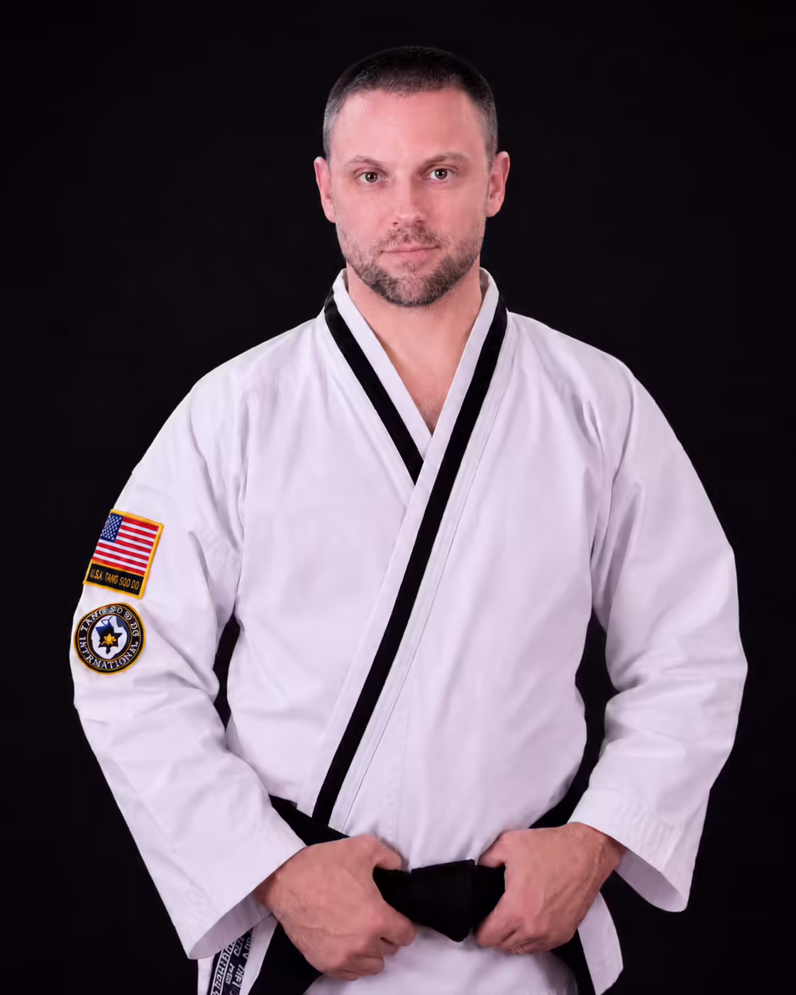 Ryan Koski, 3rd Degree Black Belt instructor at Dunedin Taekwondo Academy